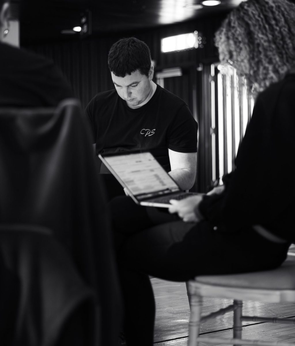 a cps ,ember staff in a meeting with a client