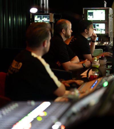 3 techs around equipment