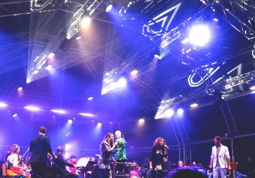 CPS Group performers on stage at a festival